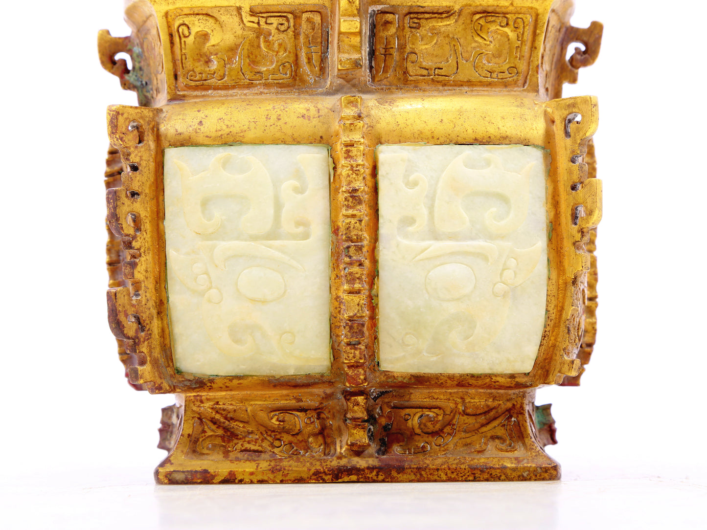 An exquisite bronze jar inlaid with white jade with animal mask patterns