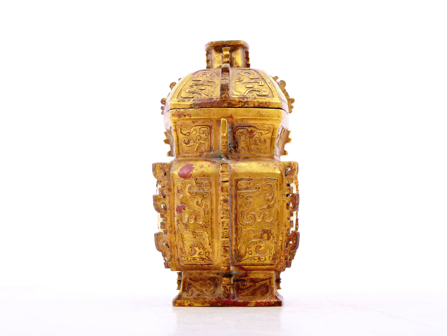 An exquisite bronze jar inlaid with white jade with animal mask patterns