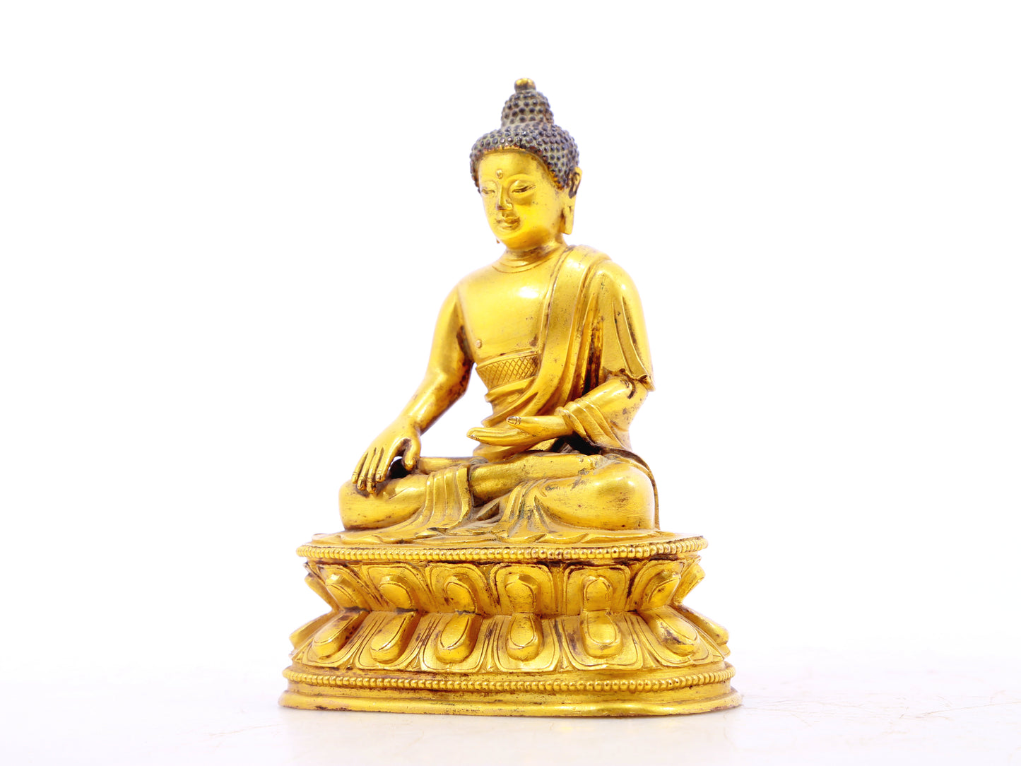 A serene alloy bronze Gautama Buddha