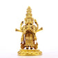 A serene gilt bronze statue of Guanyin with eleven faces