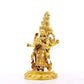 A serene gilt bronze statue of Guanyin with eleven faces