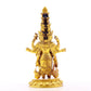 A serene gilt bronze statue of Guanyin with eleven faces