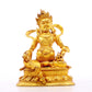 A serene gilt bronze statue of the God of Wealth