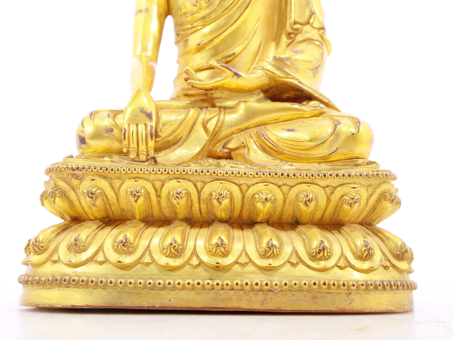 A solemn alloy bronze Gautama Buddha