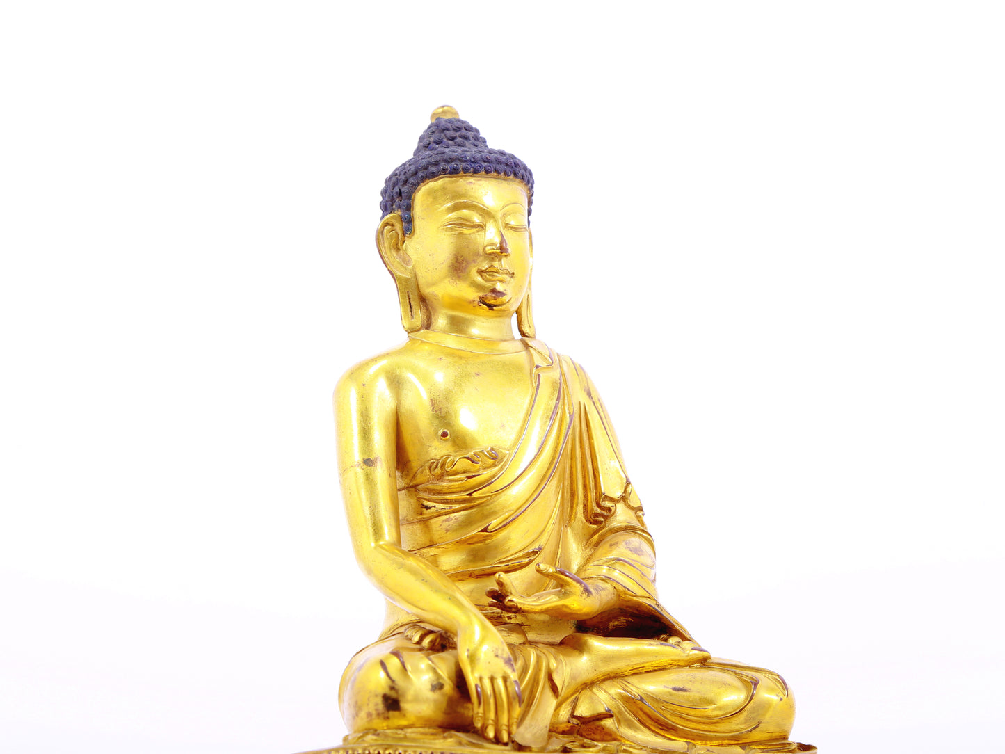 A solemn alloy bronze Gautama Buddha