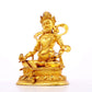 A serene gilt bronze statue of the God of Wealth