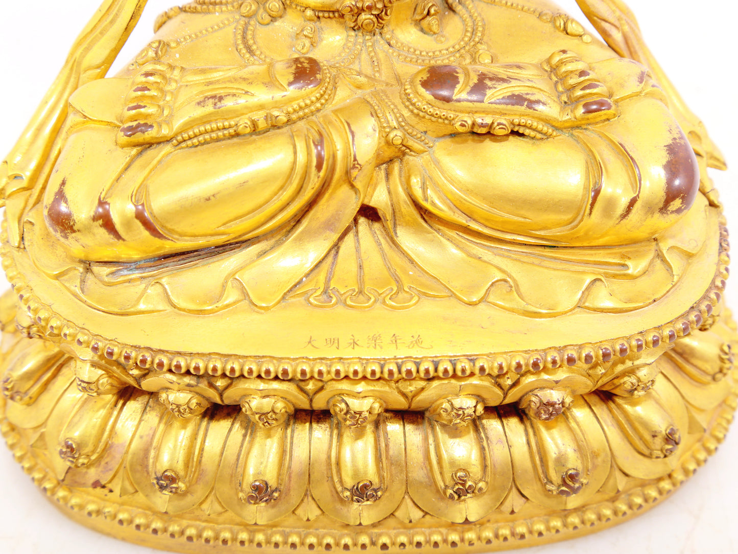 A solemn gilt bronze statue of Manjushri Bodhisattva