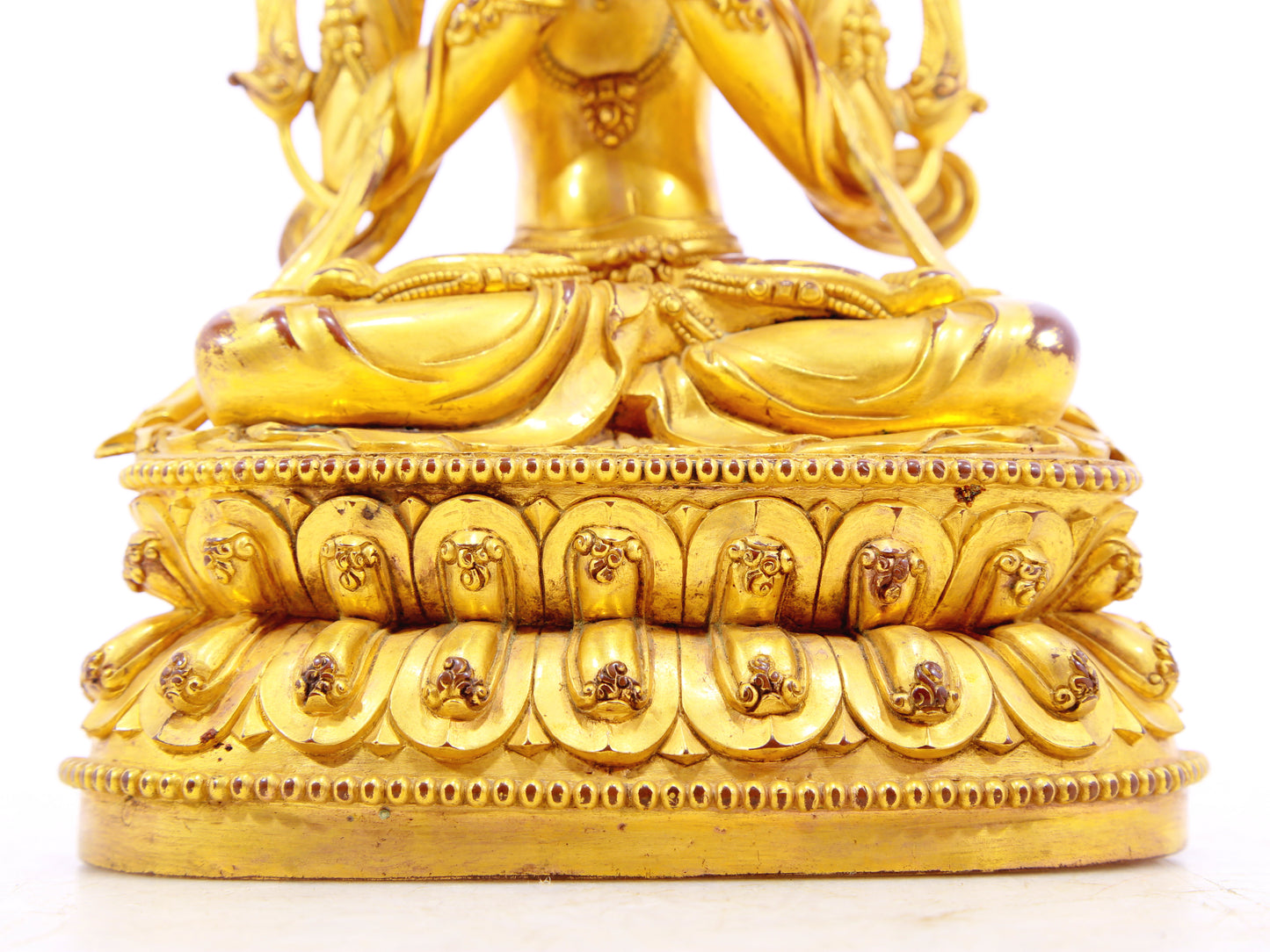 A solemn gilt bronze statue of Manjushri Bodhisattva