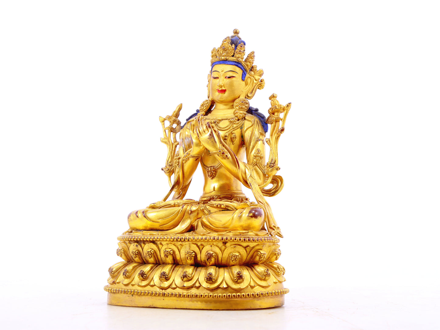 A solemn gilt bronze statue of Manjushri Bodhisattva