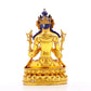 A solemn gilt bronze statue of Manjushri Bodhisattva