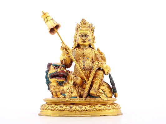 A solemn gilt bronze statue of the Heavenly King inlaid with precious stones