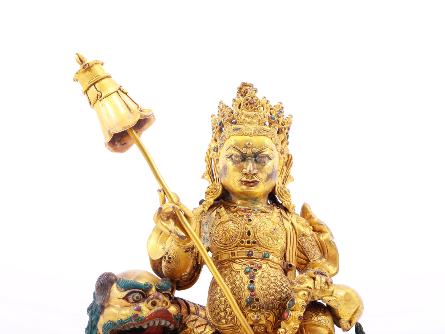 A solemn gilt bronze statue of the Heavenly King inlaid with precious stones