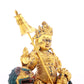 A solemn gilt bronze statue of the Heavenly King inlaid with precious stones