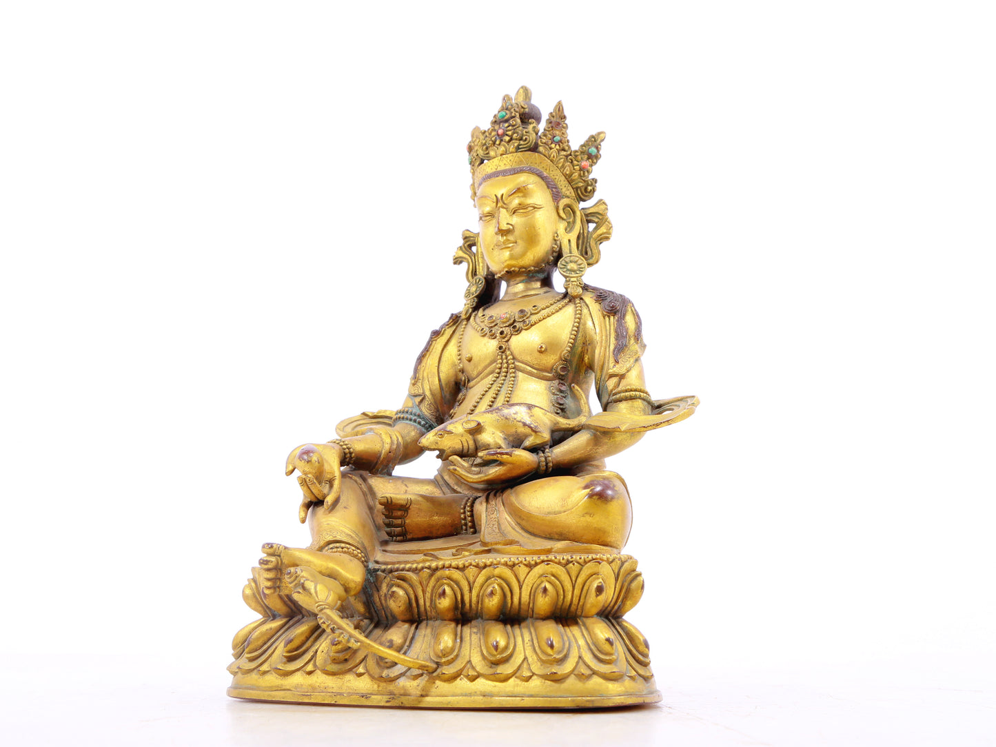 A solemn gilt bronze statue of the God of Wealth