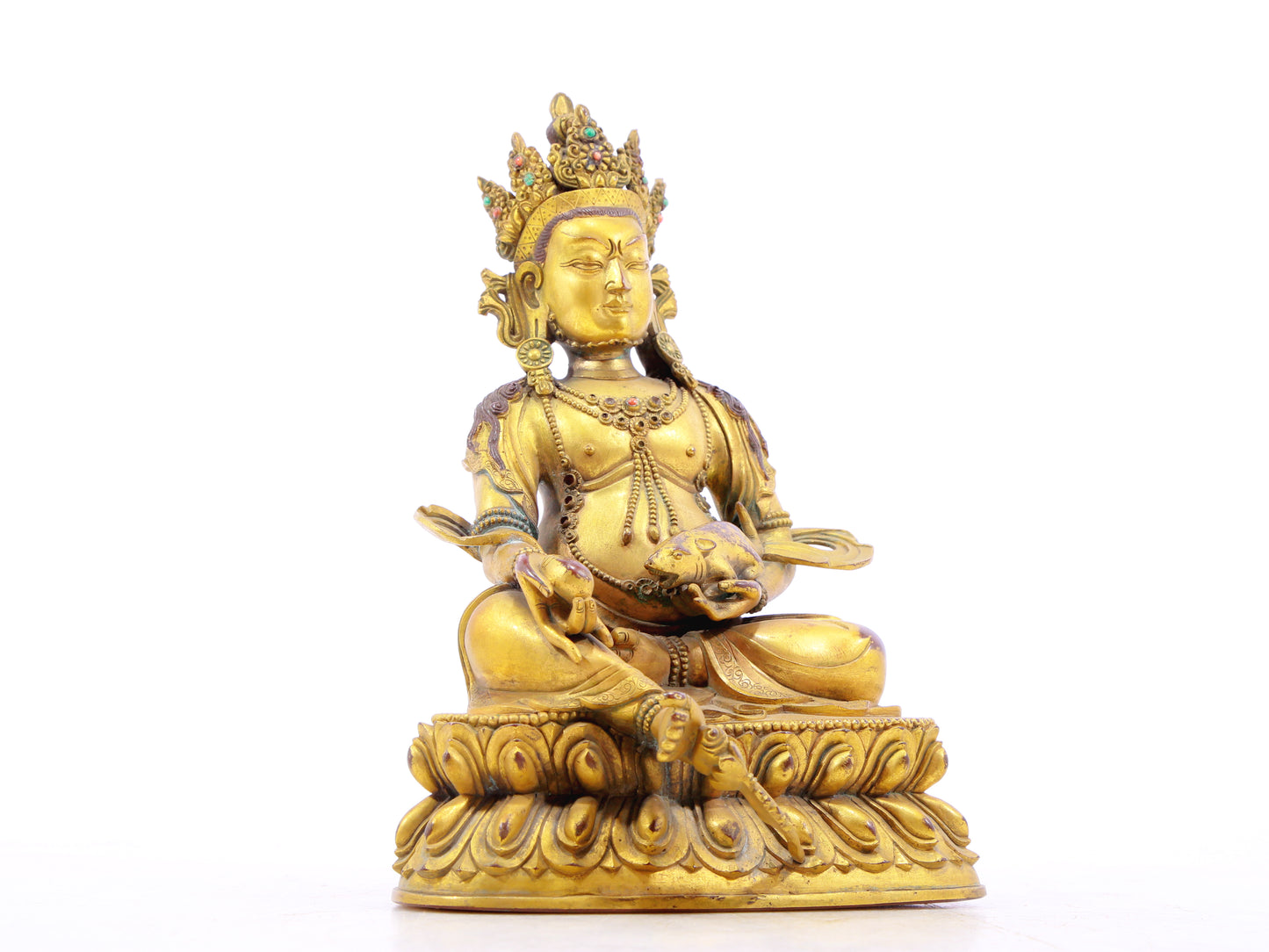 A solemn gilt bronze statue of the God of Wealth