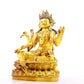 A solemn gilt bronze six-armed Guanyin statue