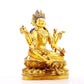 A solemn gilt bronze six-armed Guanyin statue