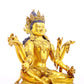 A solemn gilt bronze six-armed Guanyin statue