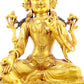 A solemn gilt bronze statue of Tara