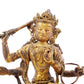 A serene gilt bronze statue of Manjusri with four arms