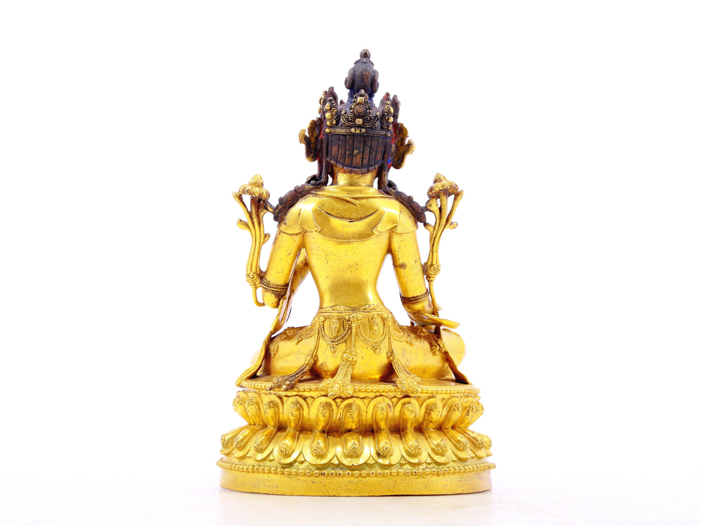 A solemn gilt bronze statue of Tara