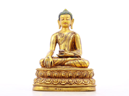 A solemn alloy bronze Gautama Buddha