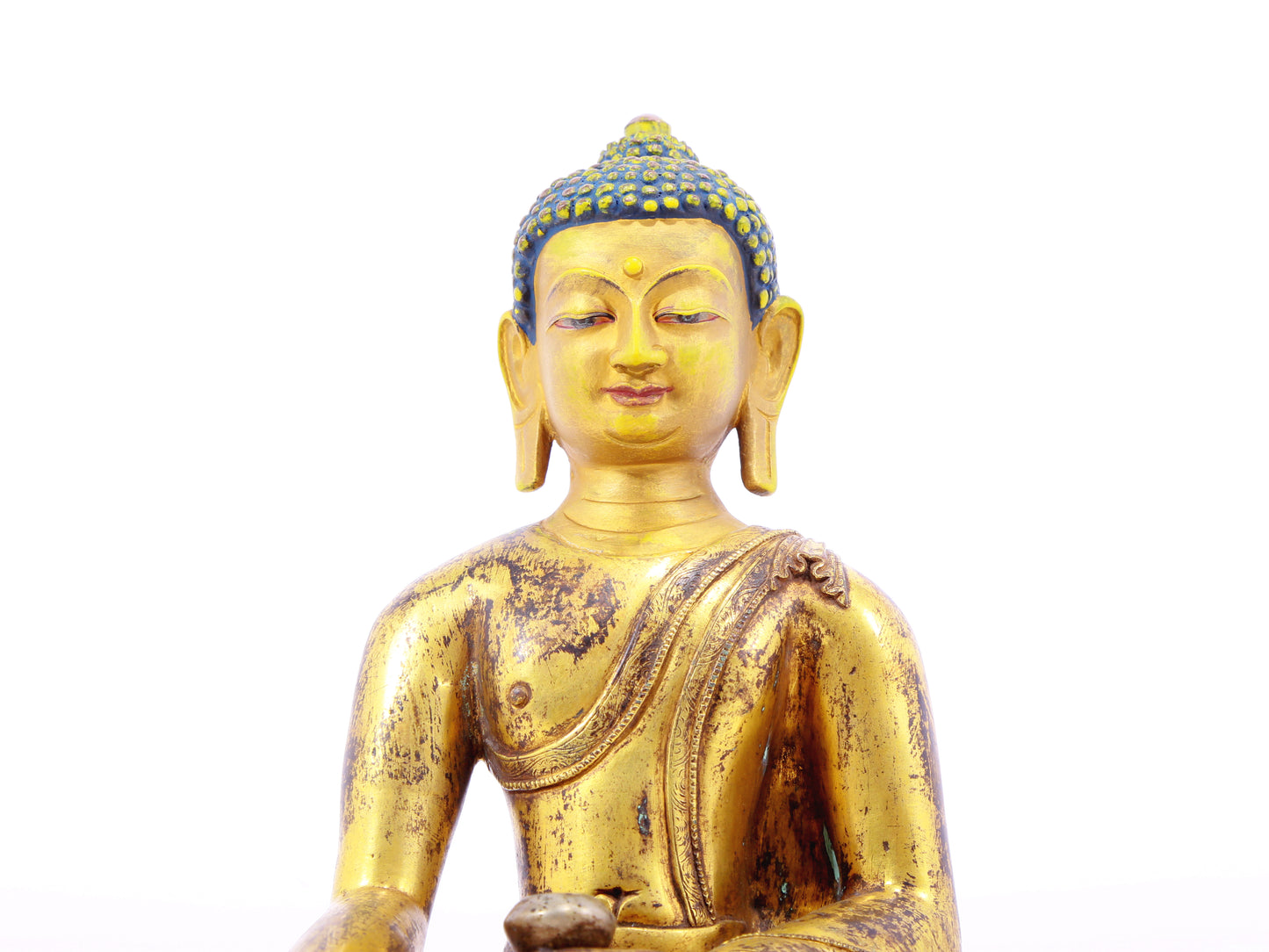 A solemn alloy bronze Gautama Buddha