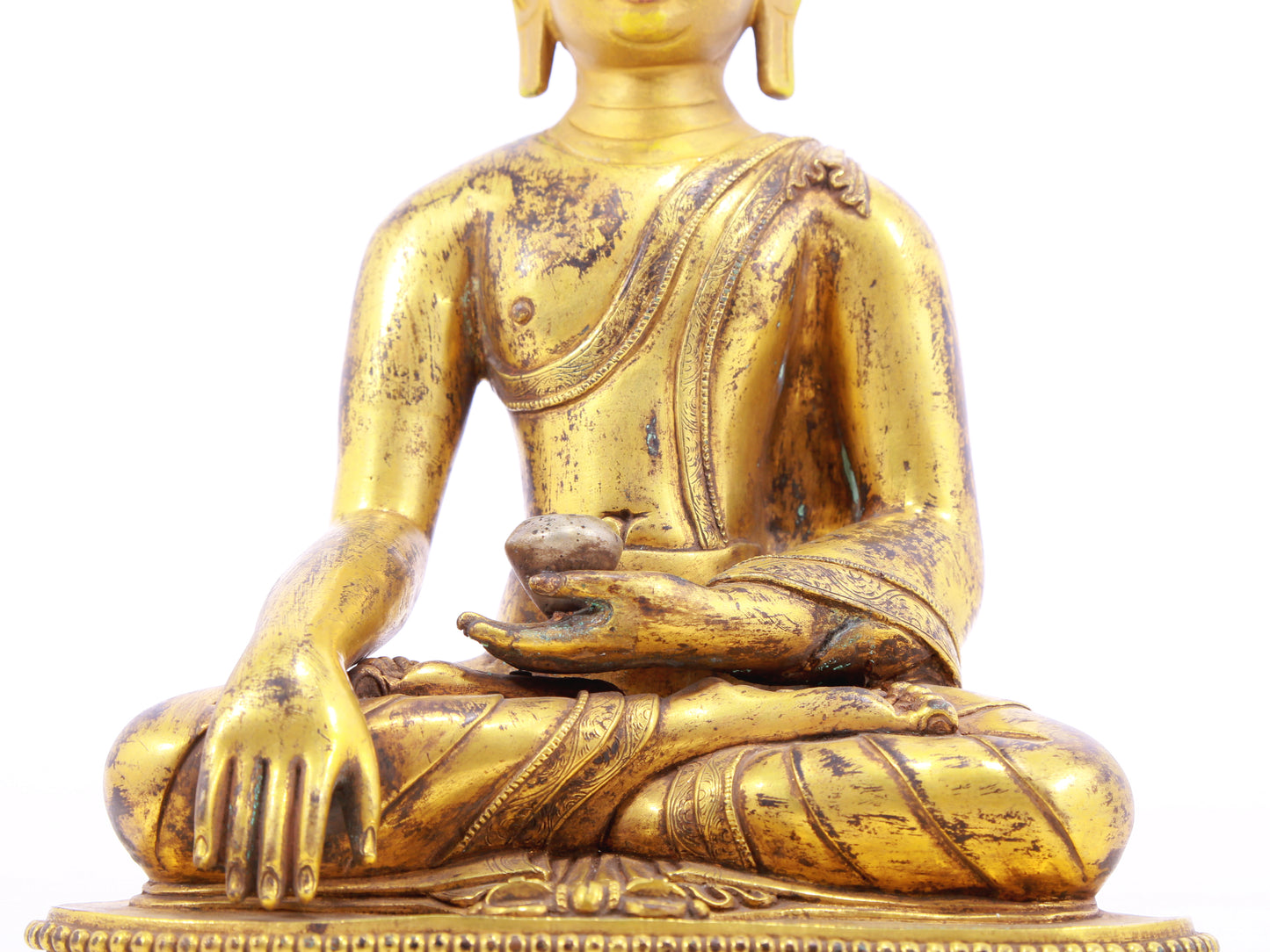 A solemn alloy bronze Gautama Buddha