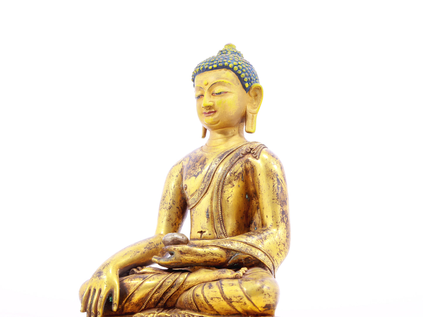 A solemn alloy bronze Gautama Buddha