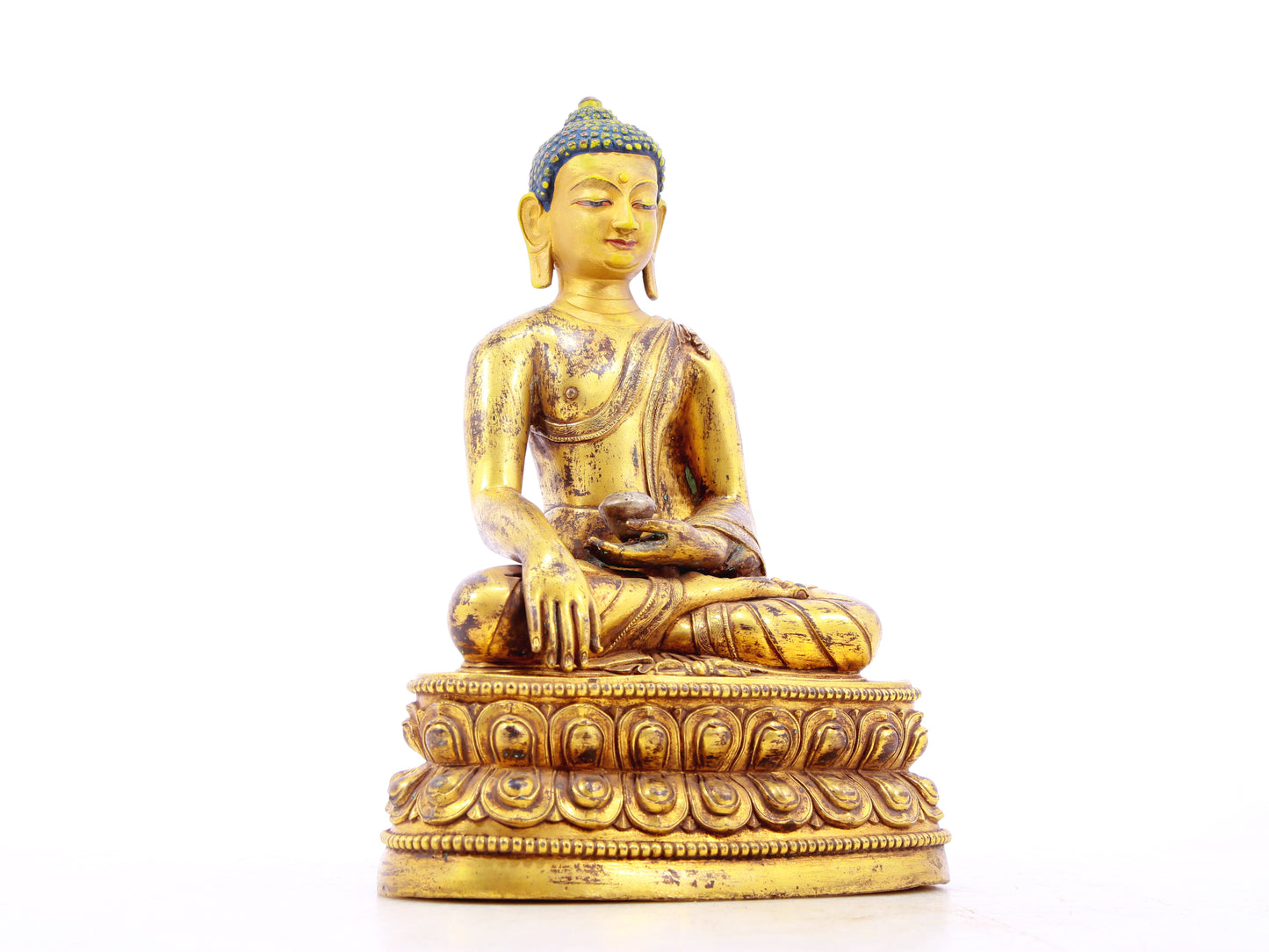 A solemn alloy bronze Gautama Buddha