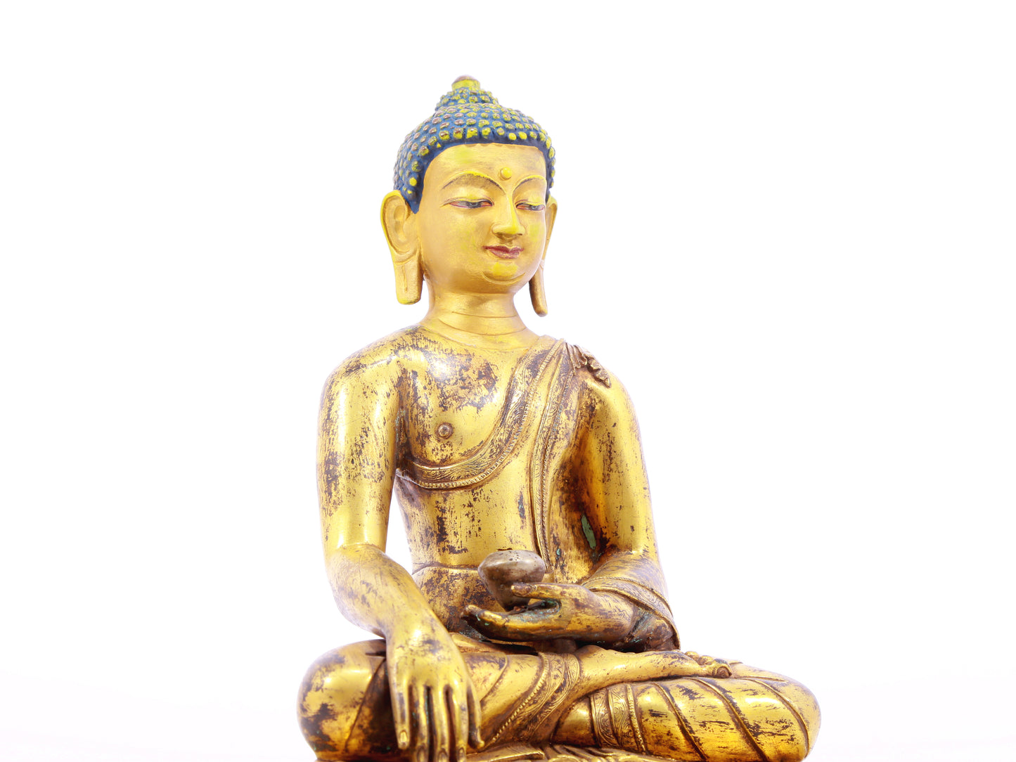 A solemn alloy bronze Gautama Buddha