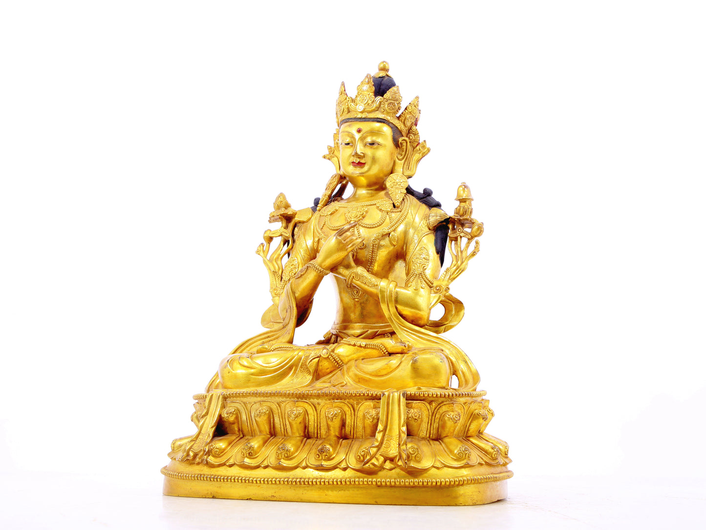 A solemn gilt bronze statue of Bodhisattva