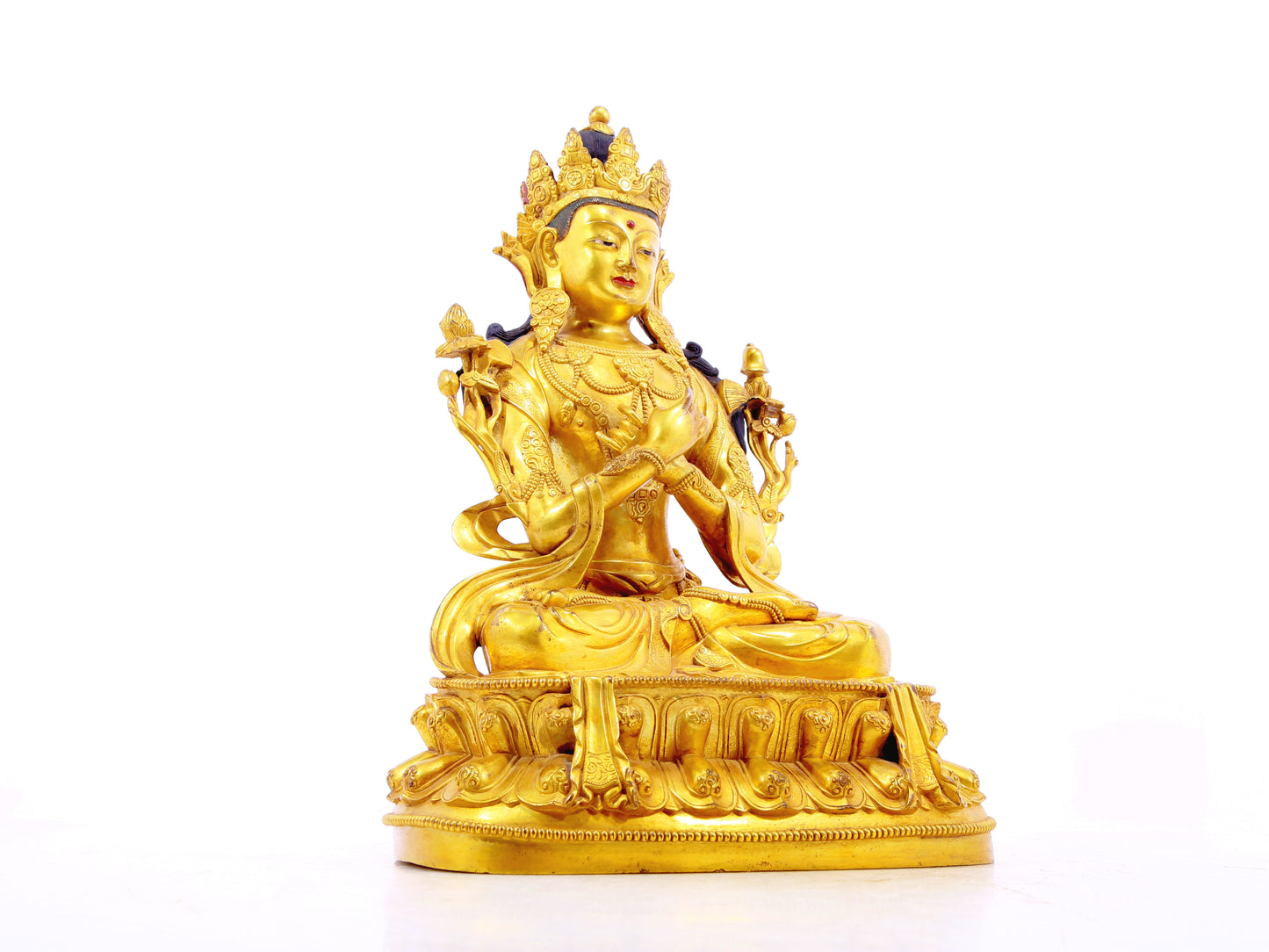 A solemn gilt bronze statue of Bodhisattva