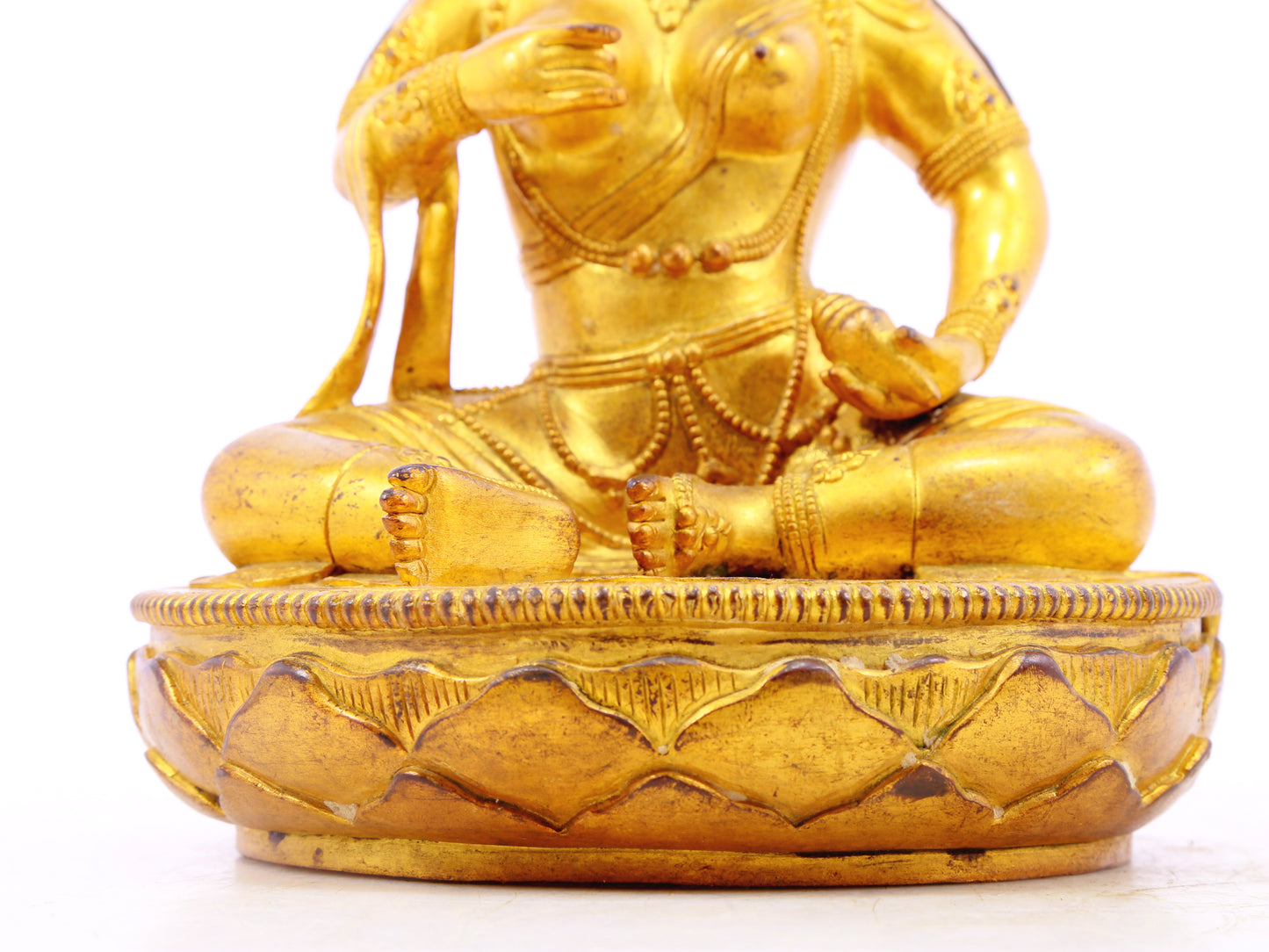 A solemn gilt bronze statue of Bodhisattva