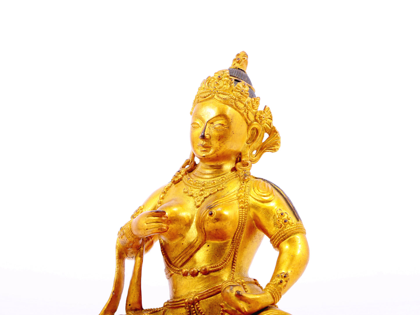 A solemn gilt bronze statue of Bodhisattva