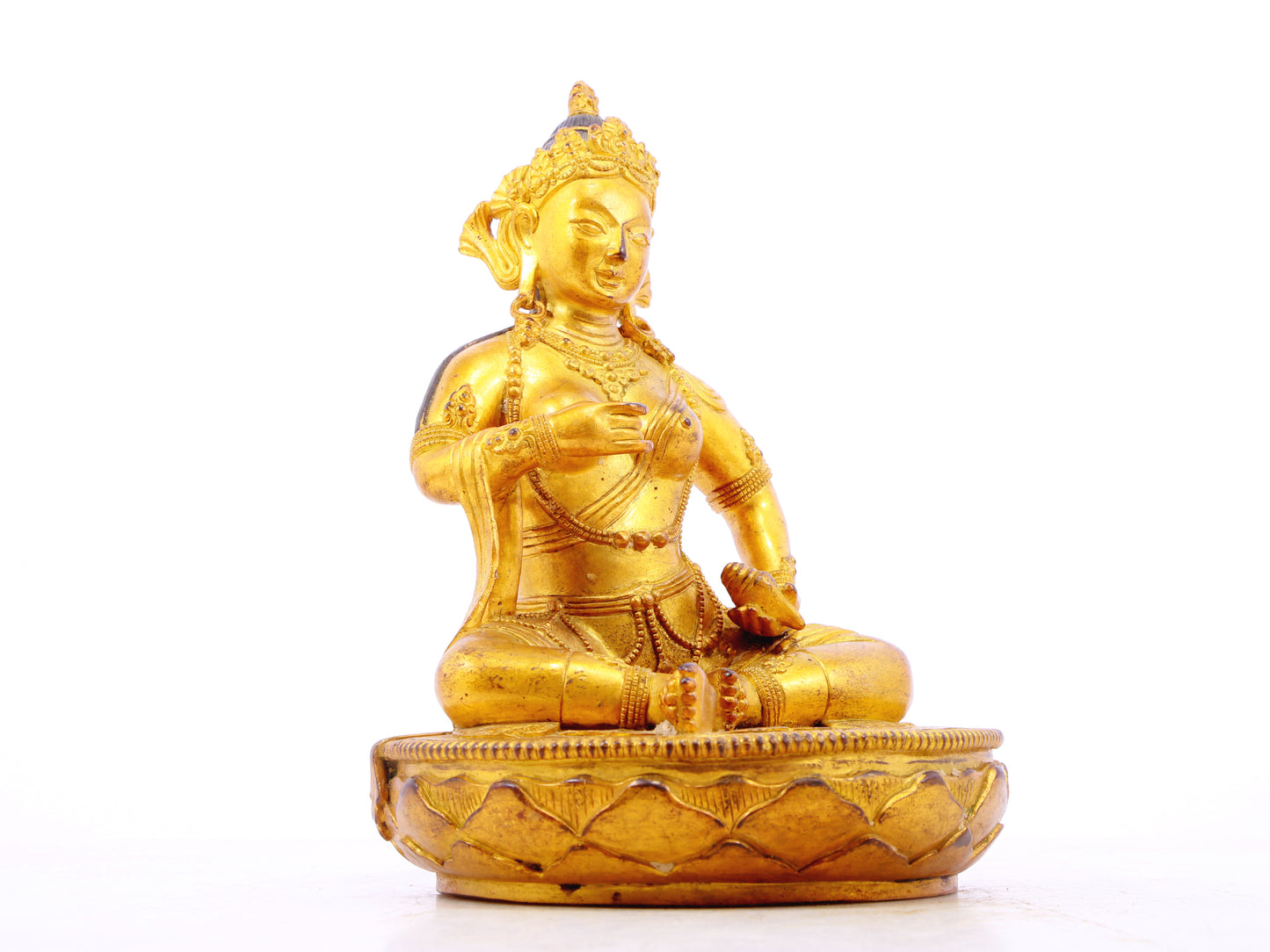 A solemn gilt bronze statue of Bodhisattva