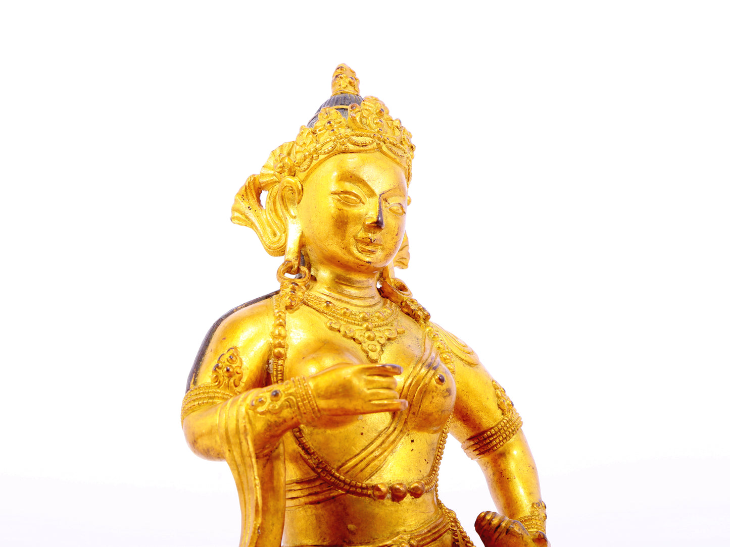 A solemn gilt bronze statue of Bodhisattva