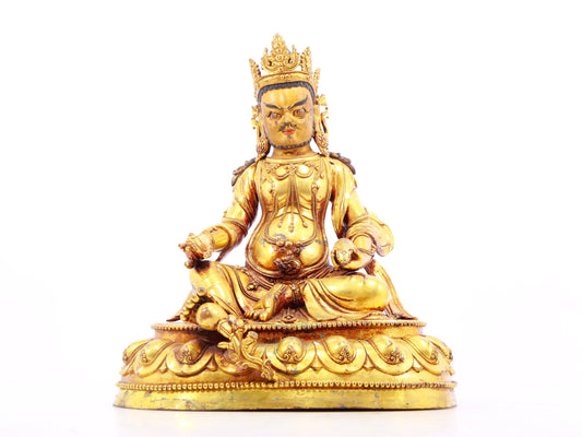 A solemn gilt bronze statue of the God of Wealth