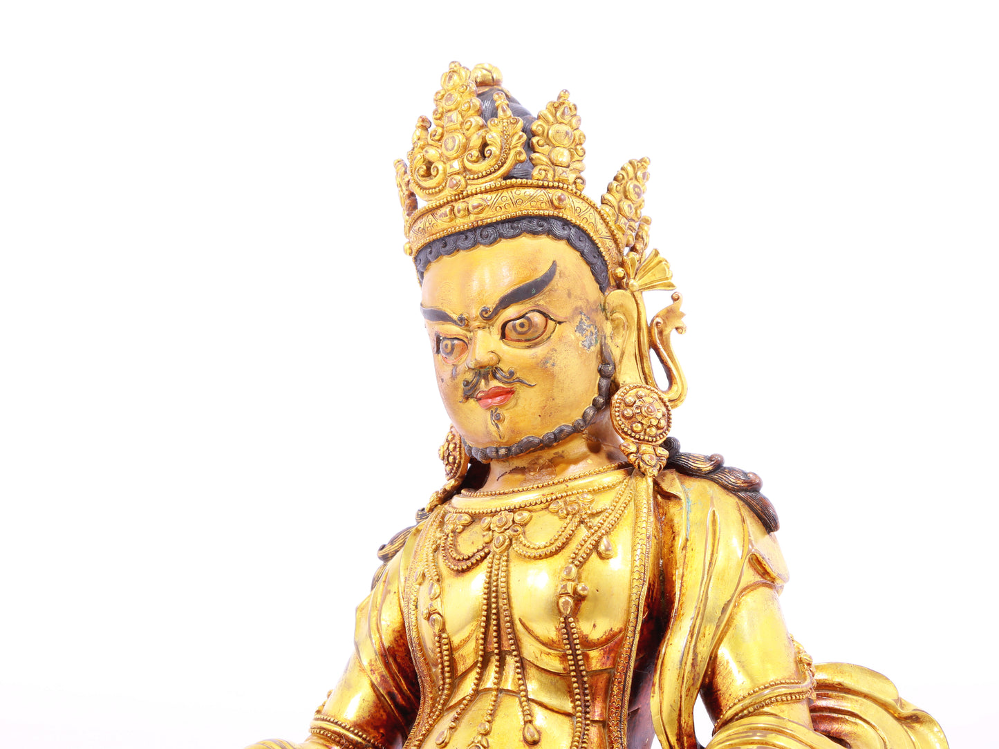 A solemn gilt bronze statue of the God of Wealth