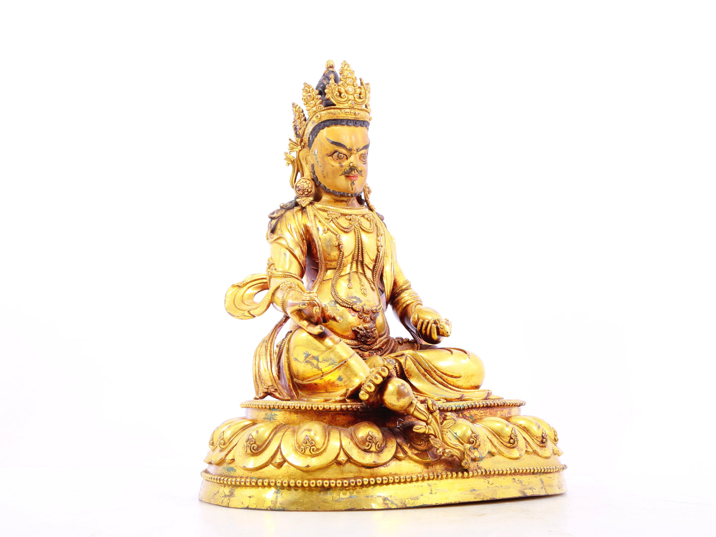 A solemn gilt bronze statue of the God of Wealth