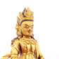 A solemn gilt bronze statue of the God of Wealth