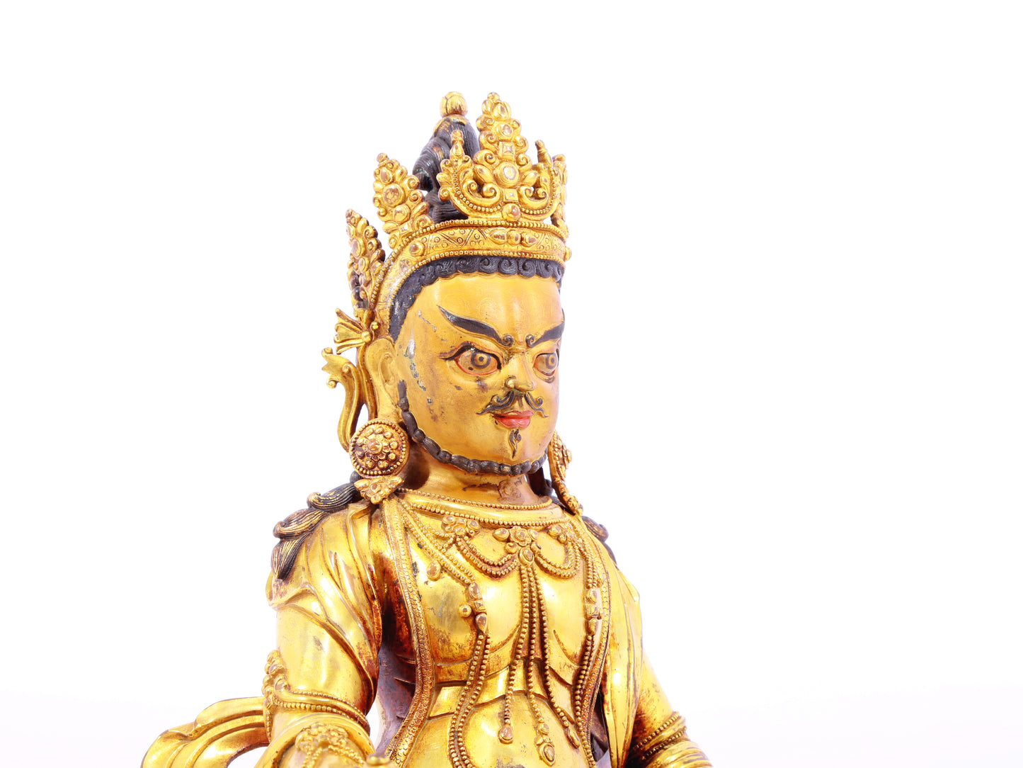 A solemn gilt bronze statue of the God of Wealth