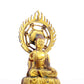 A solemn gilt bronze statue of Gautama Buddha