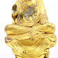 A solemn gilt bronze statue of Gautama Buddha