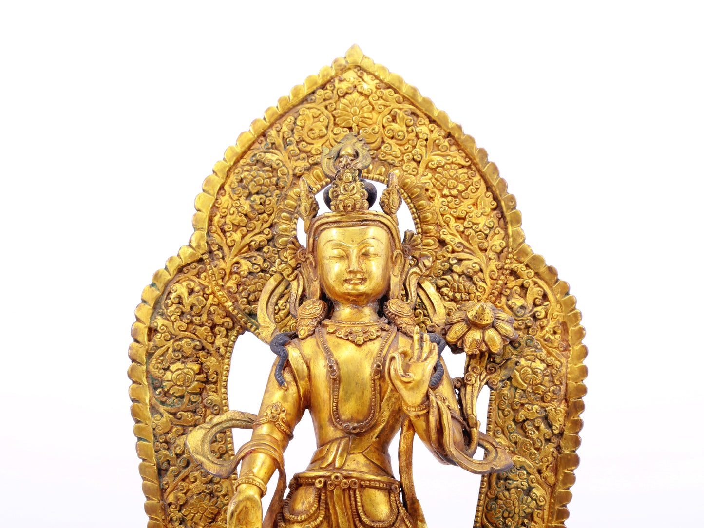 A solemn gilt bronze statue of Tara