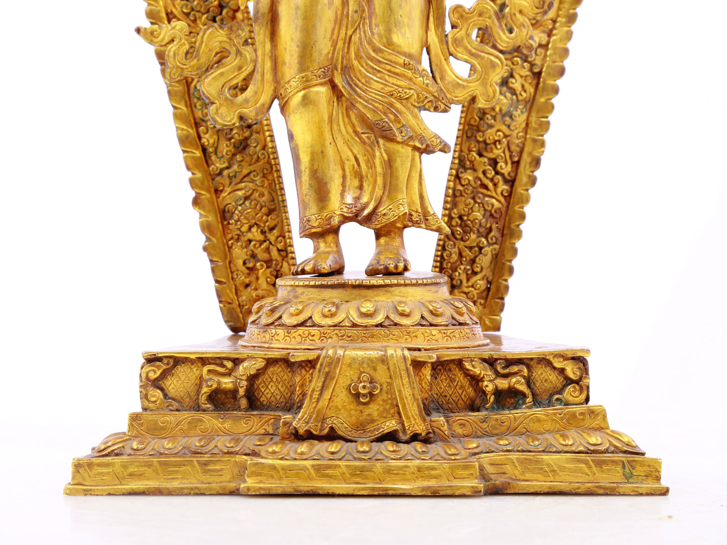 A solemn gilt bronze statue of Tara