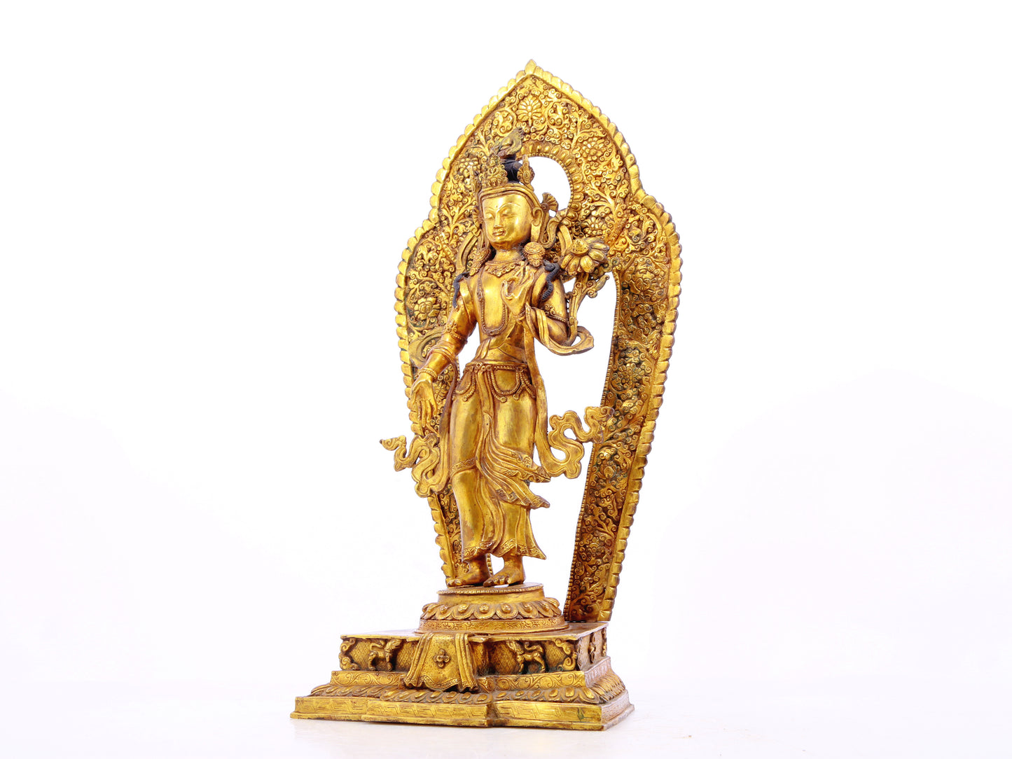 A solemn gilt bronze statue of Tara