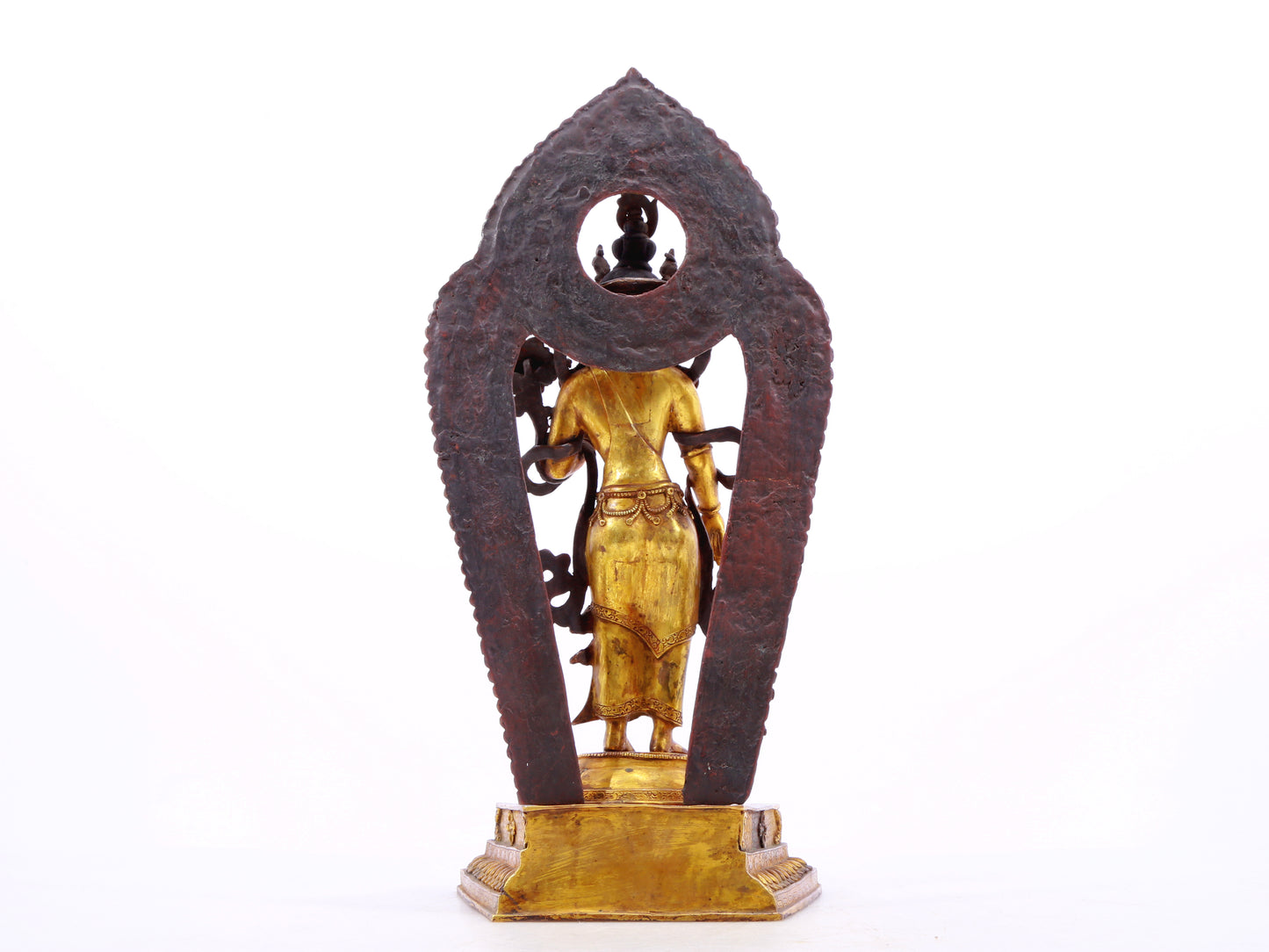 A solemn gilt bronze statue of Tara