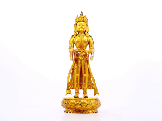 A solemn gilt bronze Bodhisattva stands