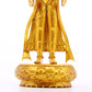 A solemn gilt bronze Bodhisattva stands